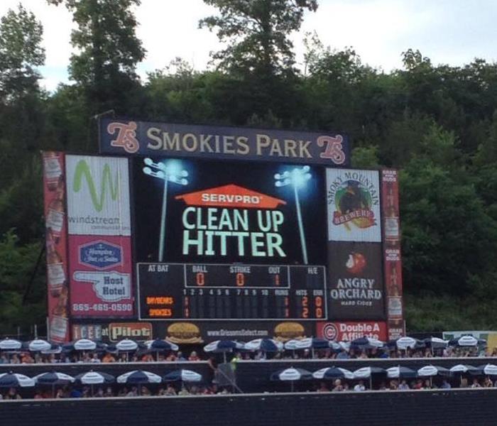 score board at Smokies Park with SERVPRO logo on screen